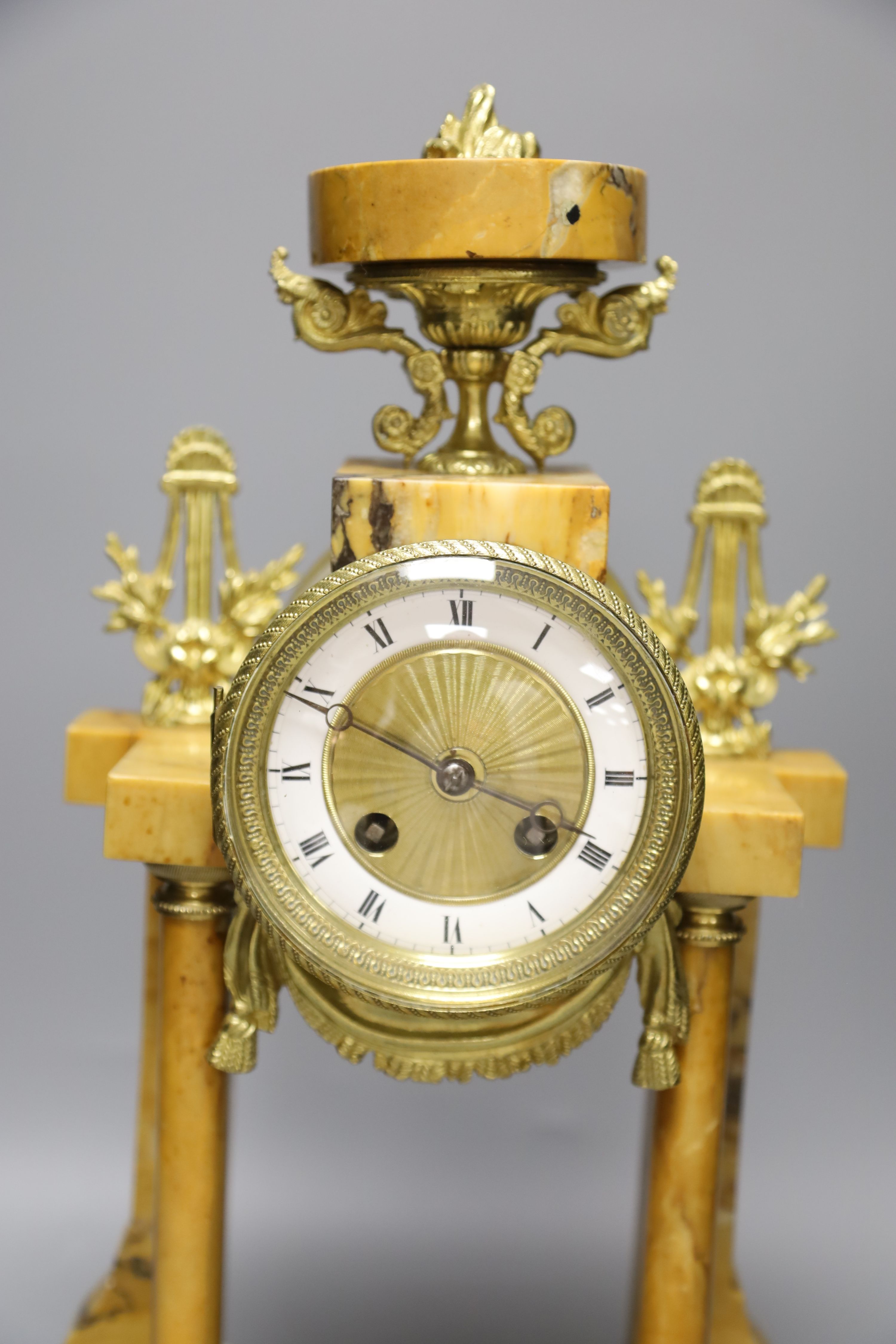 A French gilt metal and marble mantel clock, height 43cm